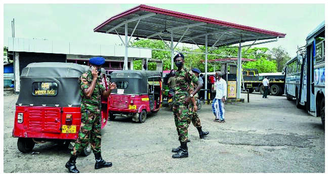 Sri Lanka troops open fire to contain fuel riots