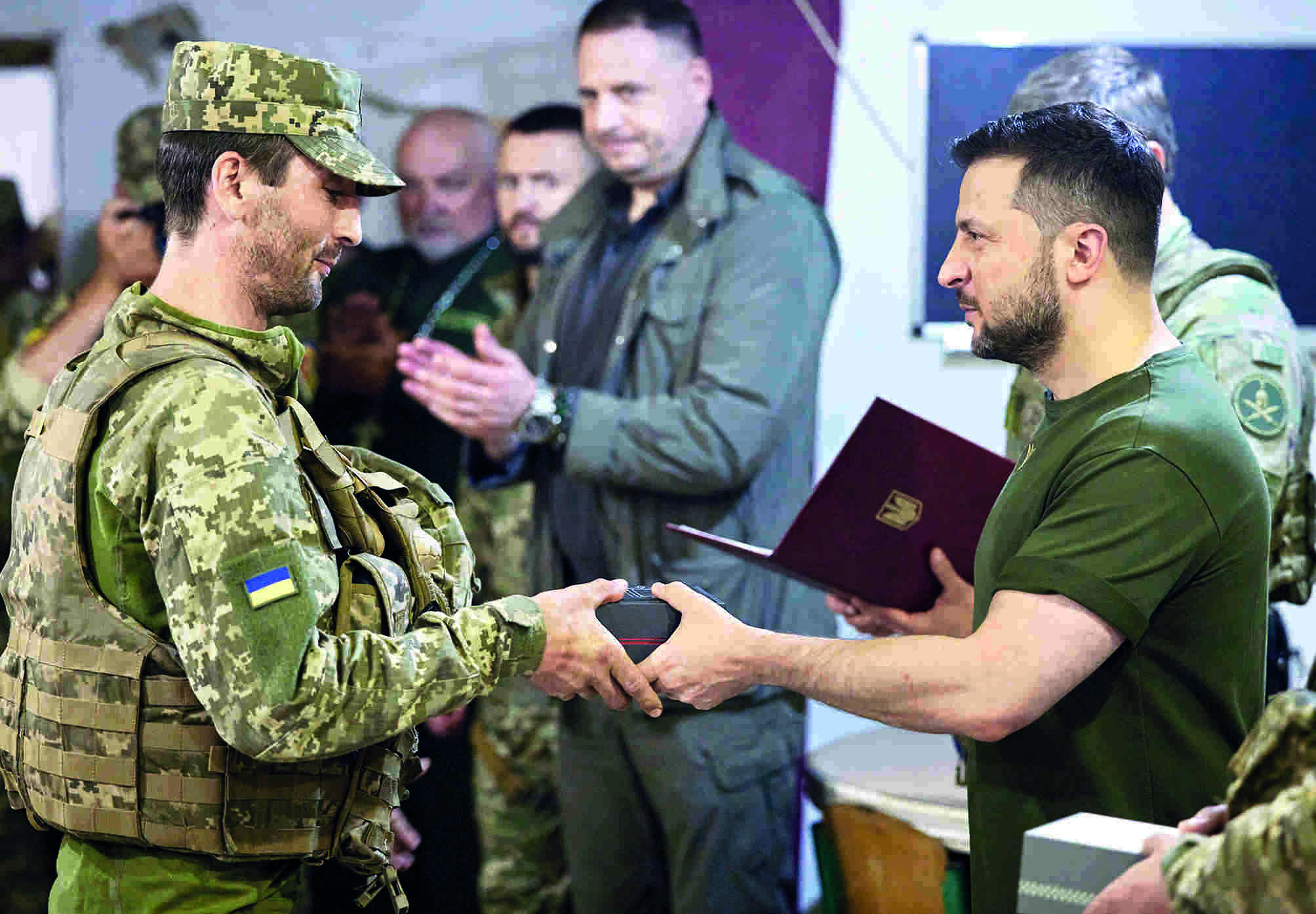 Zelensky vows to retake south, NATO warns of long war