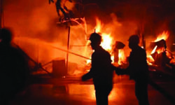 Lamp lit for prayer sets docs bungalow in   Noida on fire; 13 rescued, 2 firefighters hurt