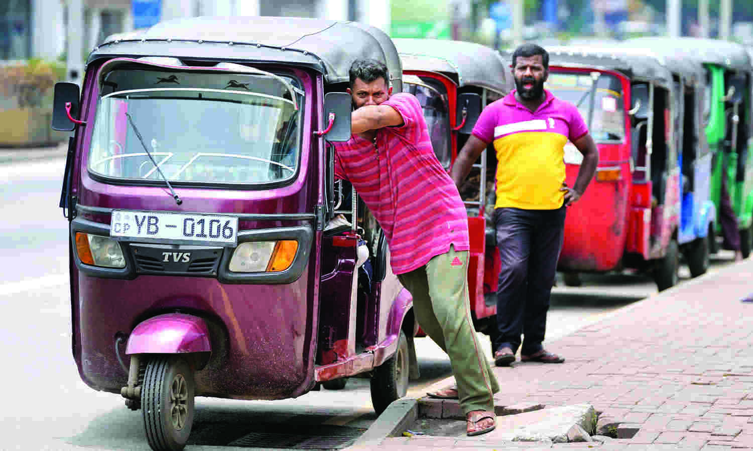 Lanka hikes fuel prices as filling stations go dry