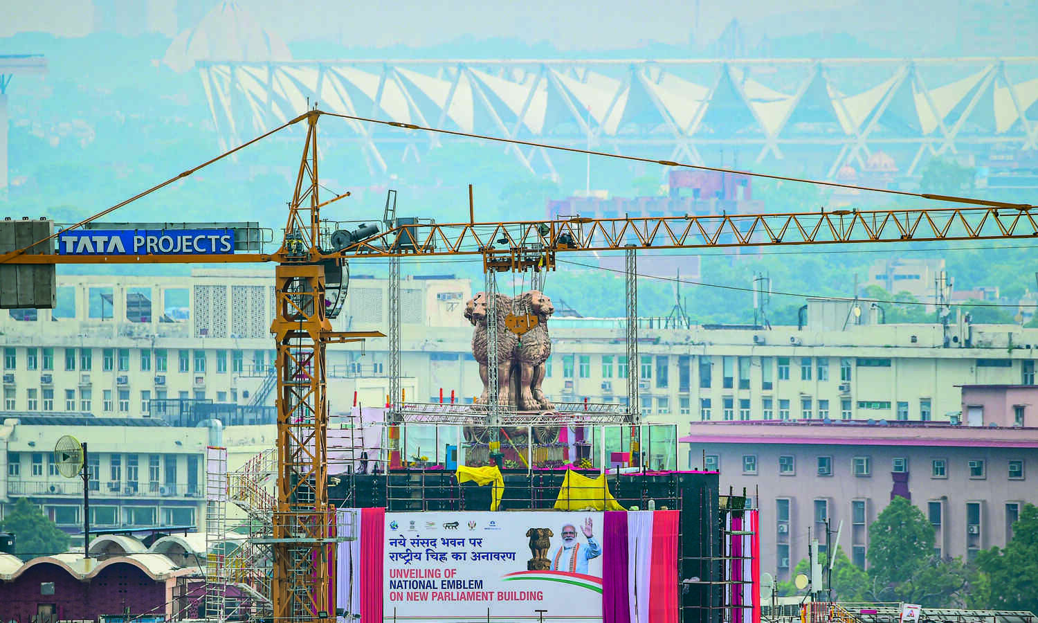 PM Modi unveils national emblem atop Parl building