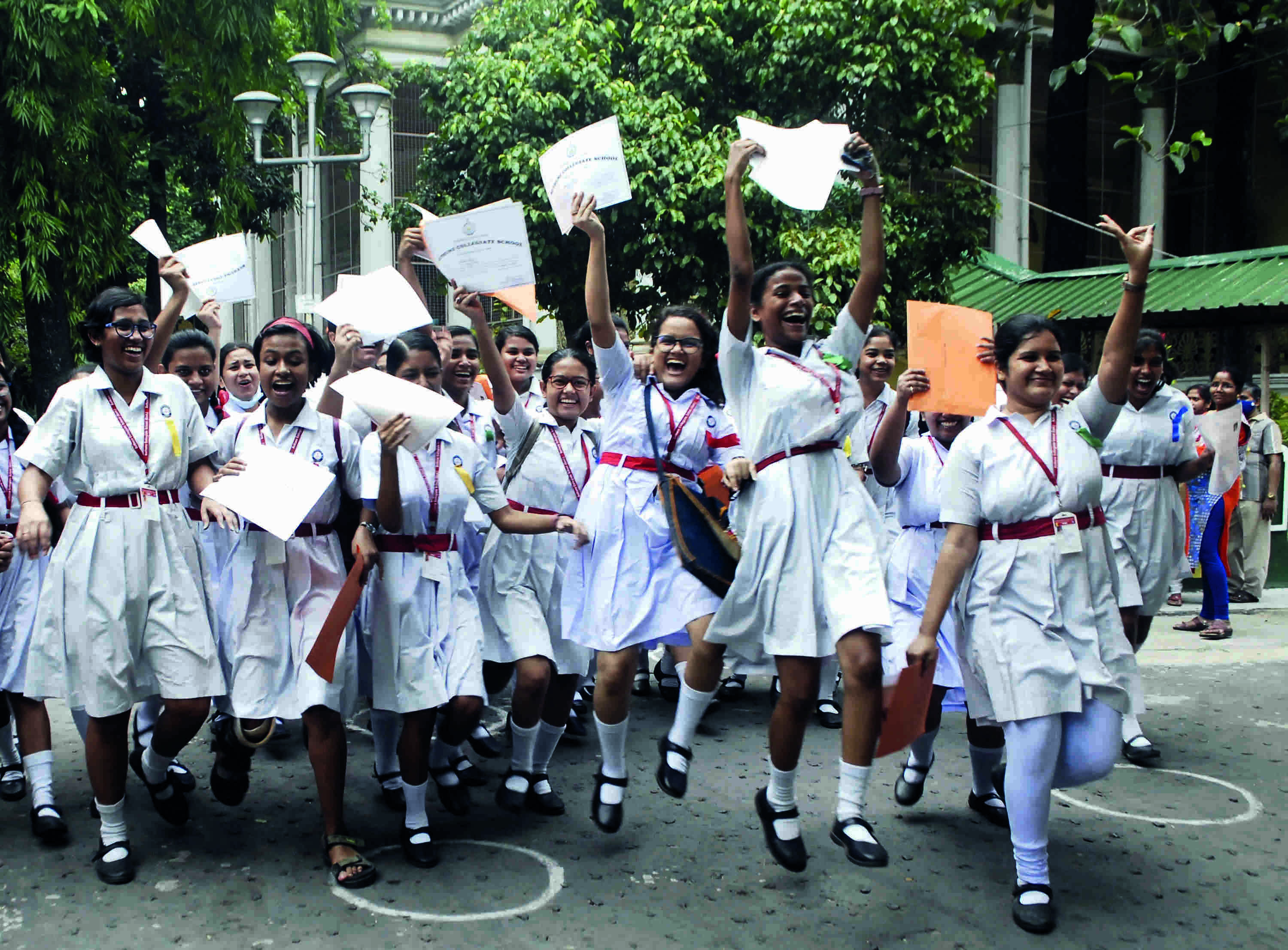 Review: Marks of 19.85% change in HS; 18 more in top 10 in Madhyamik