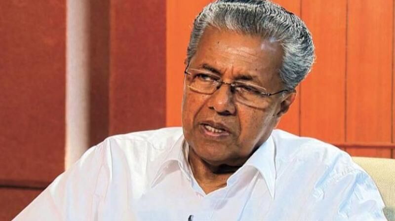 Gold Smuggling: Youth Cong workers wave black flags at Kerala CM Gold Smuggling: Youth Cong workers wave black flags at Kerala CM