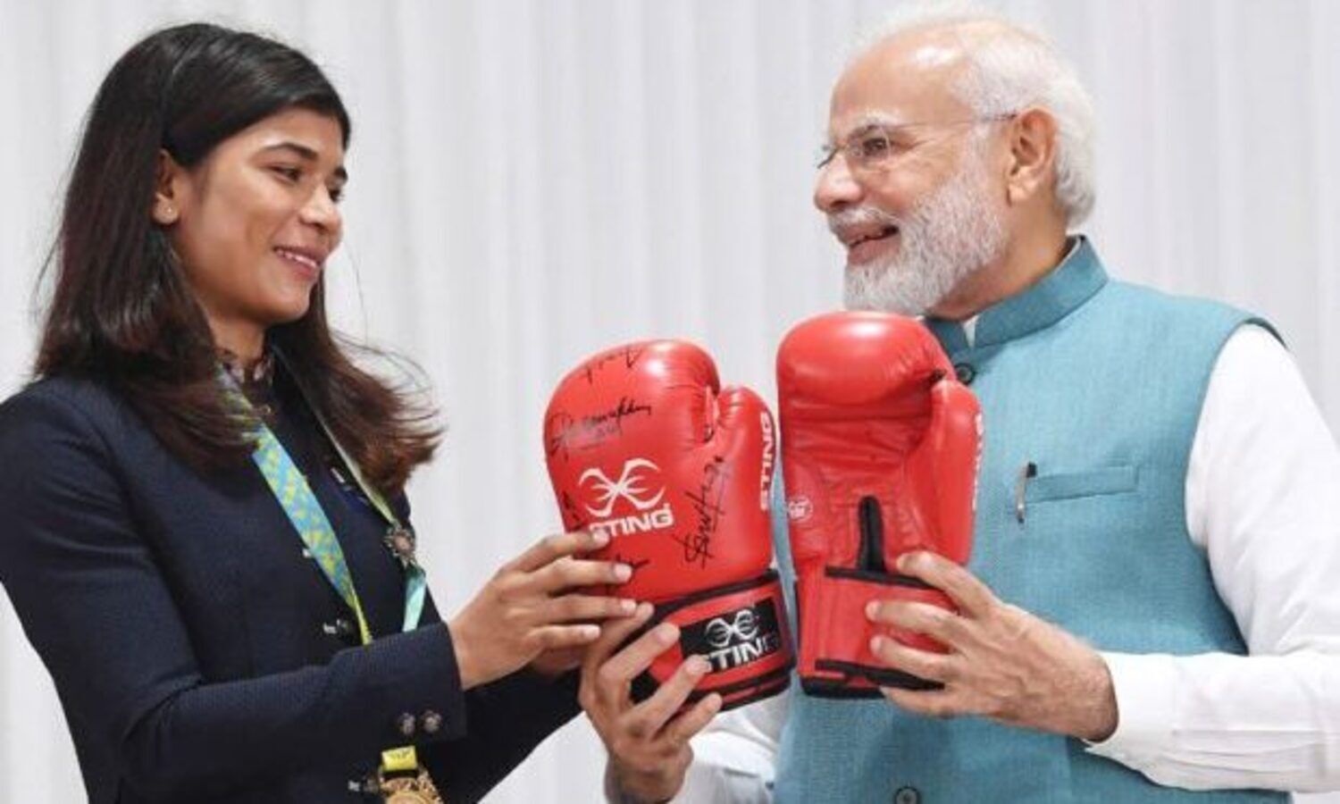 Nikhat gifts PM Modi boxing gloves, Hima gives traditional gamocha