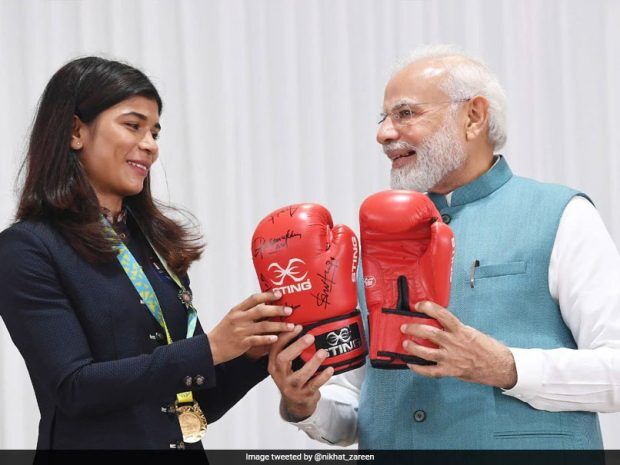 Nikhat gifts PM Modi boxing gloves, Hima gives traditional gamocha Nikhat gifts PM Modi boxing gloves, Hima gives traditional gamocha