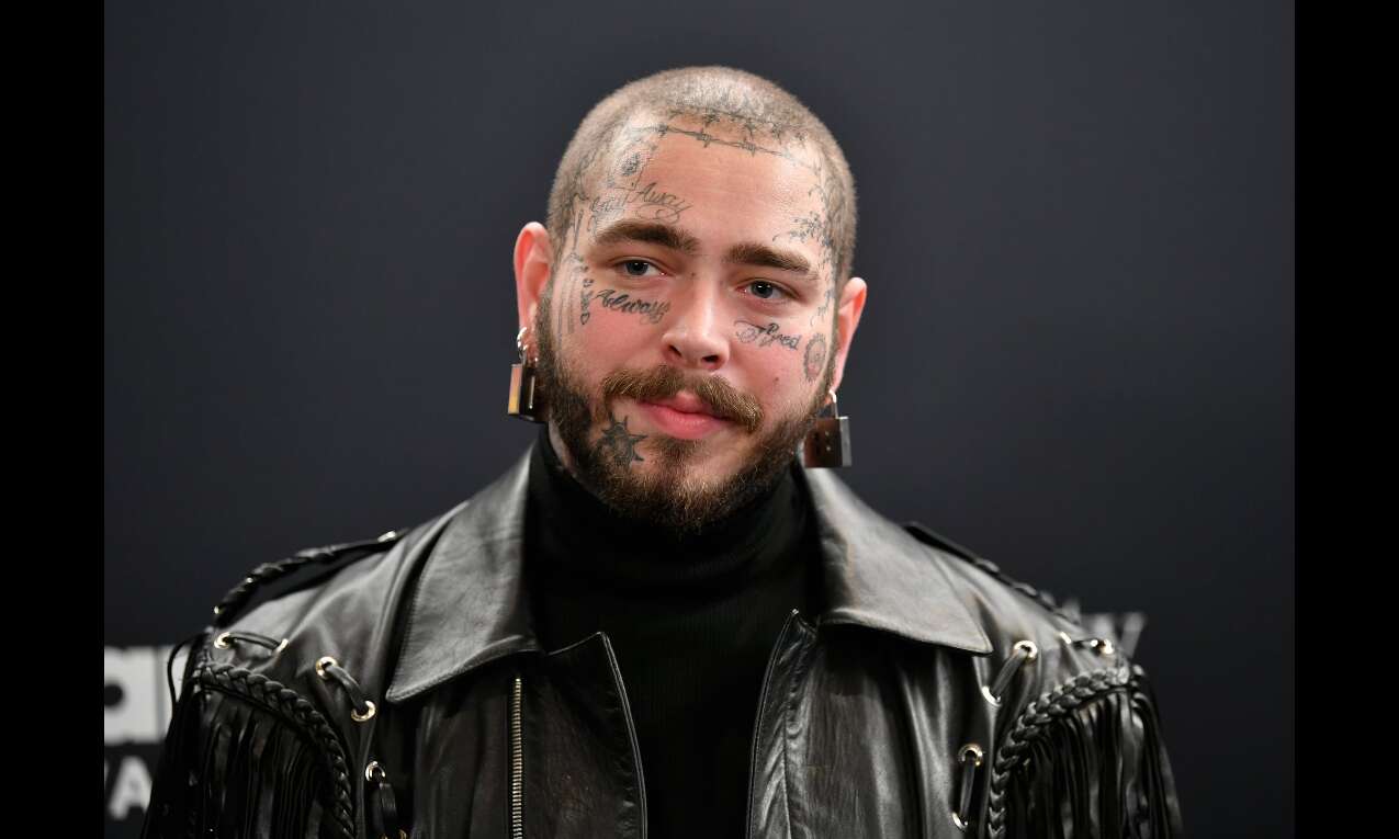 Post Malone, experiencing stabbing pain, postpones show Post Malone, experiencing stabbing pain, postpones show