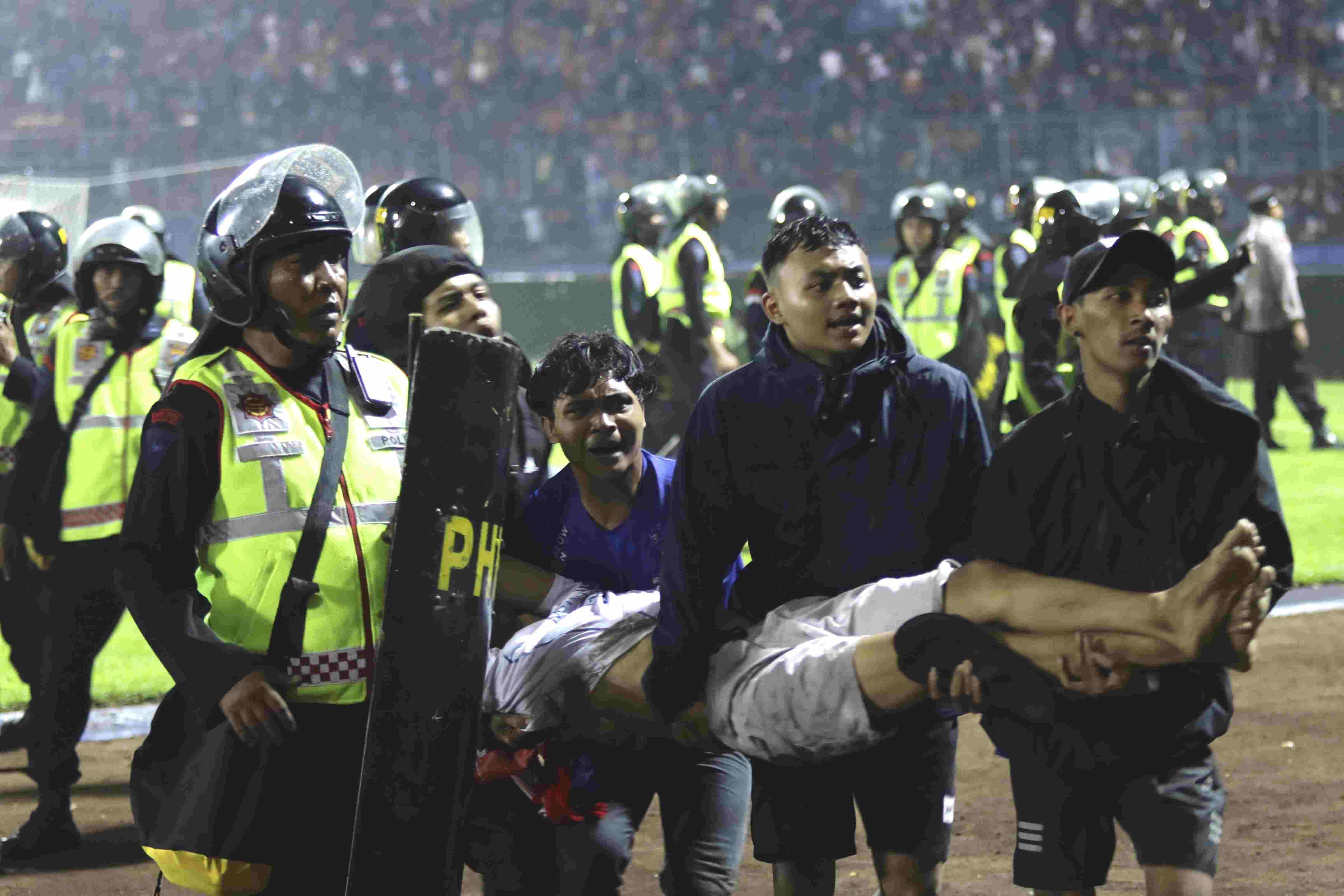 174 dead after fans stampede to exit Indonesian soccer match