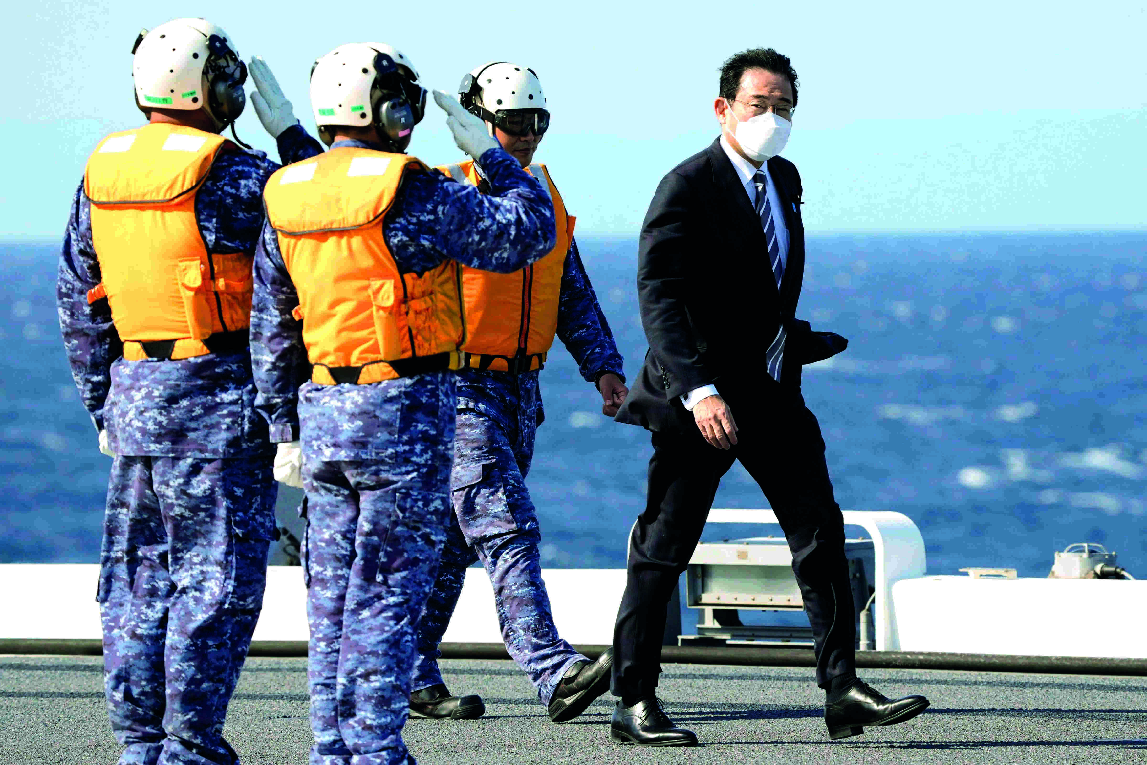 Japan PM vows to strengthen military at intl naval review Japan PM vows to strengthen military at intl naval review