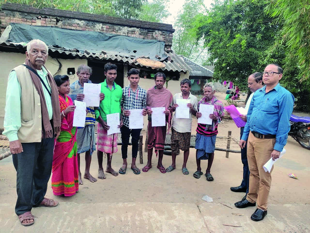 Land patta handed over to Lodha community in Jhargram district Land patta handed over to Lodha community in Jhargram district