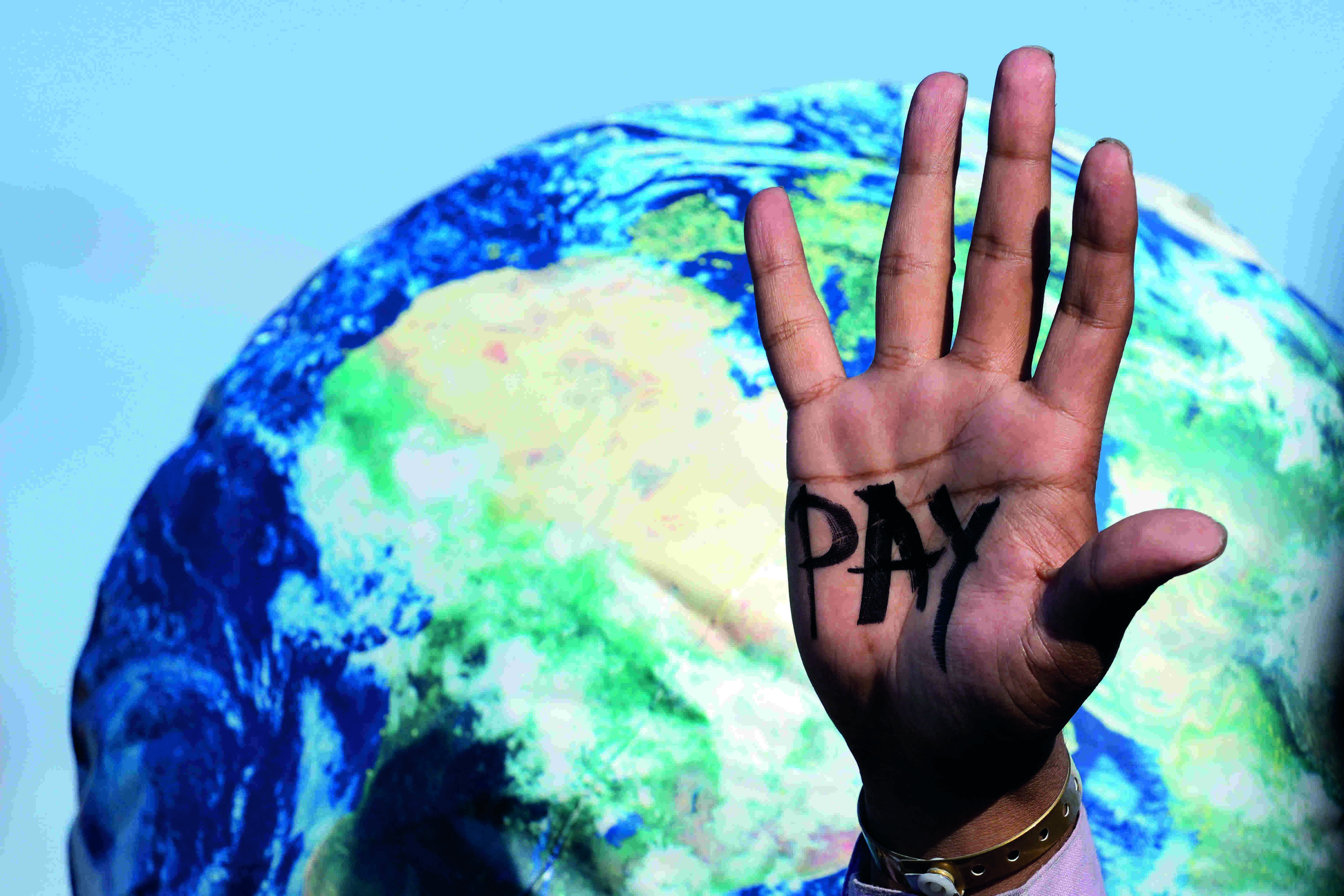 UN climate deal: Calamity cash, but no new emission cuts UN climate deal: Calamity cash, but no new emission cuts