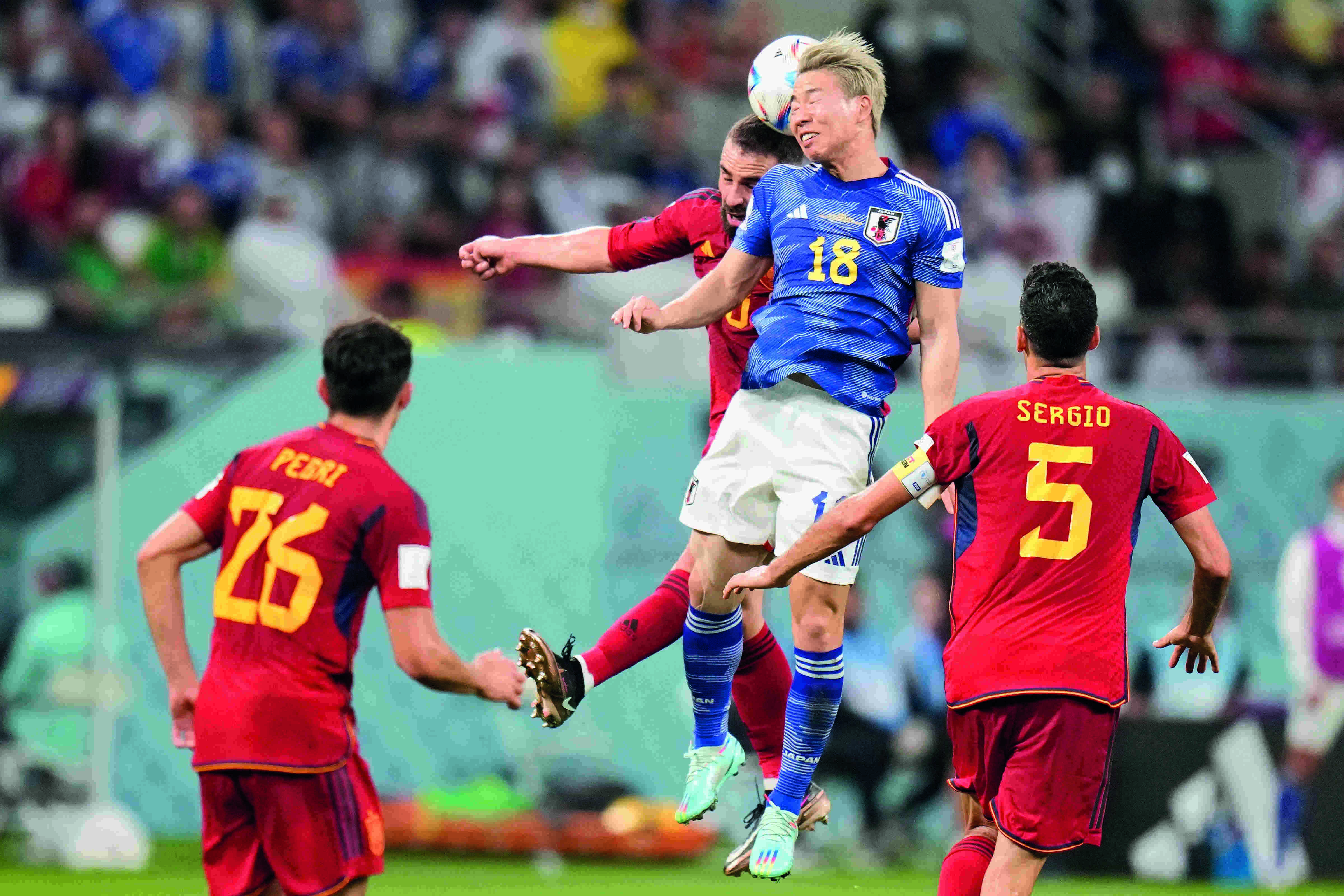 Japan beat Spain 2-1 as both teams advance to round of 16
