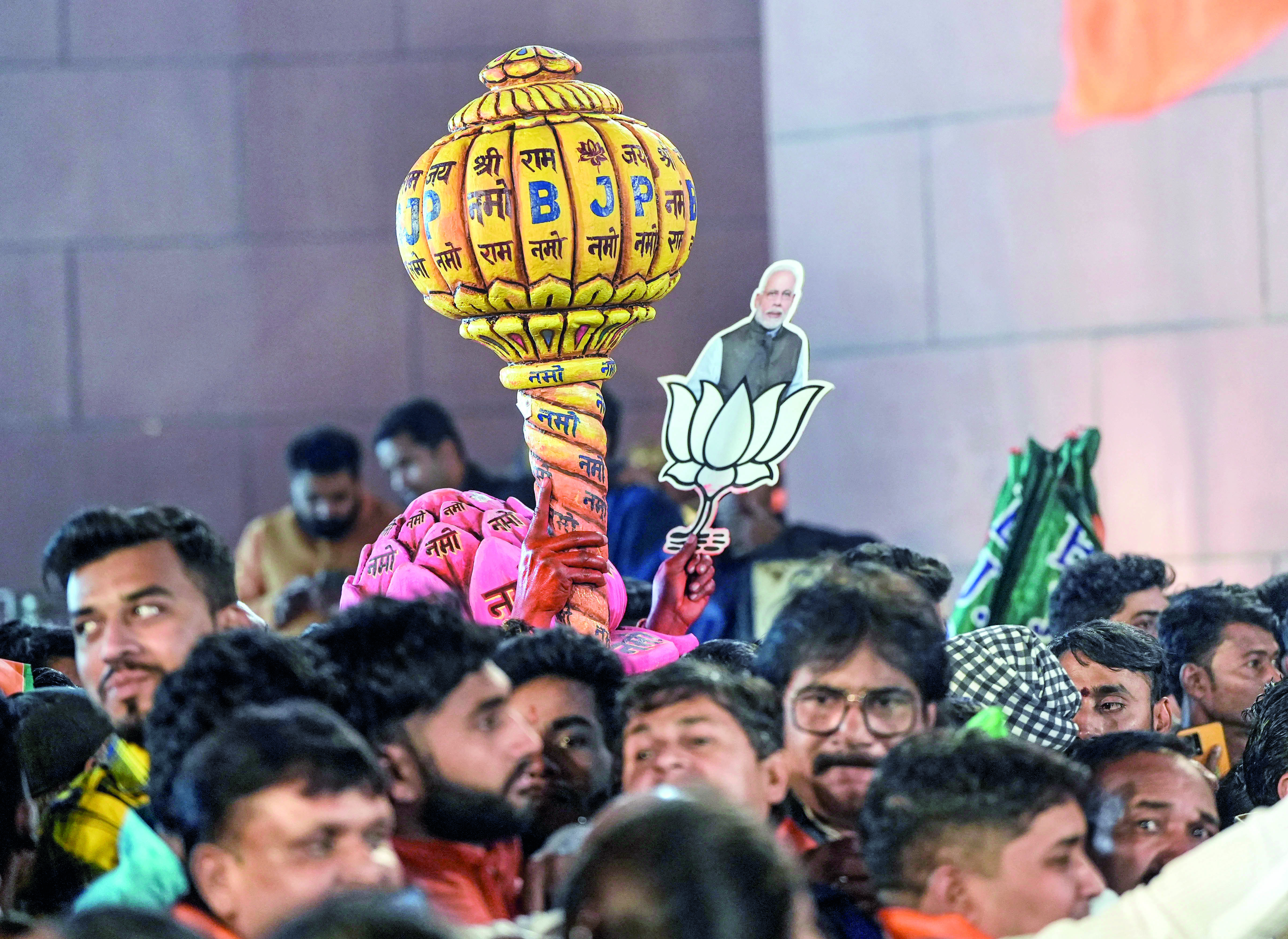 BJP makes history in Guj, Cong wrests HP BJP makes history in Guj, Cong wrests HP