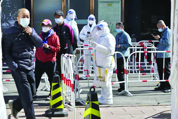 COVID-linked deaths seen in Beijing after virus rules eased