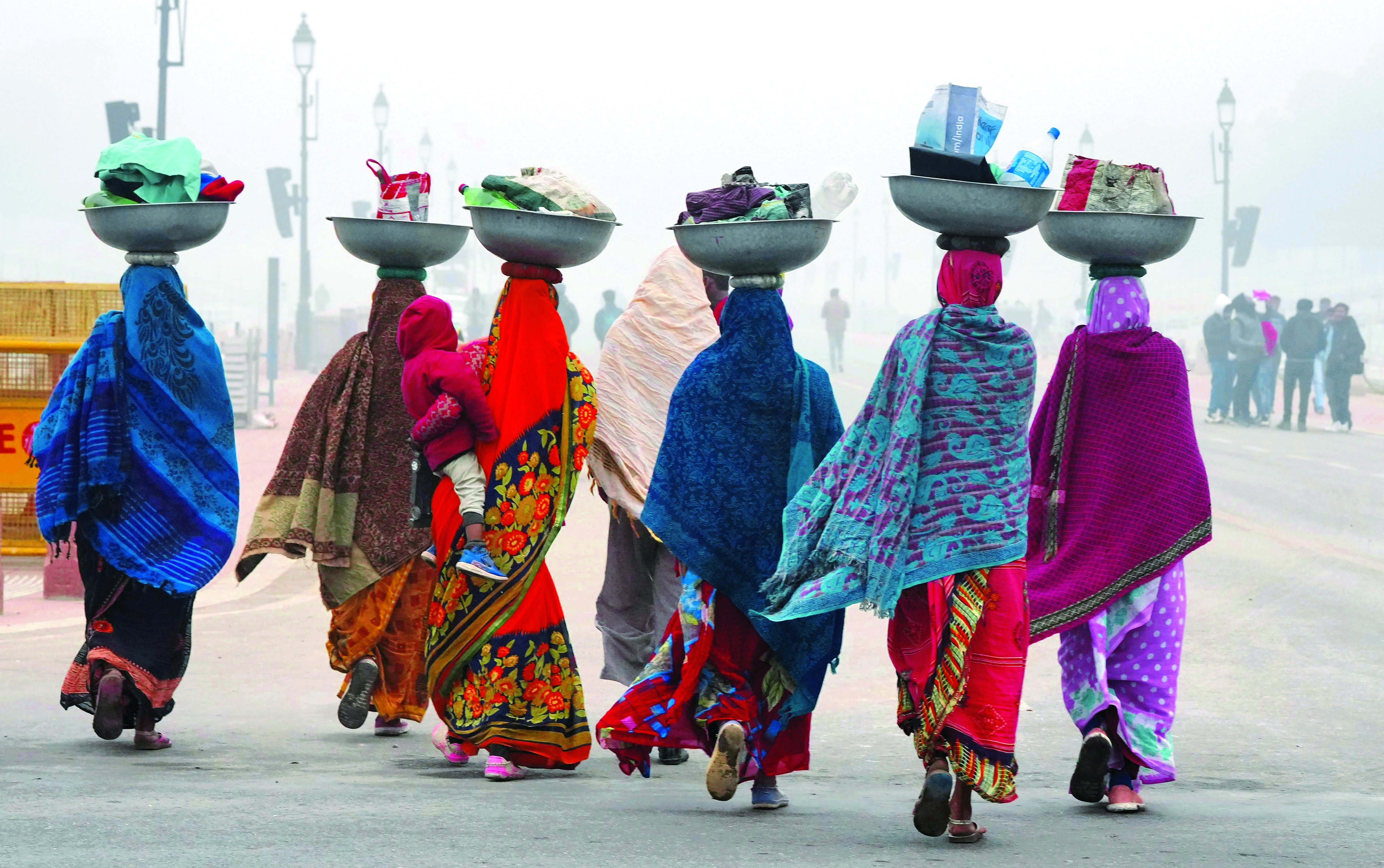North India reels under cold wave; fog hits train services