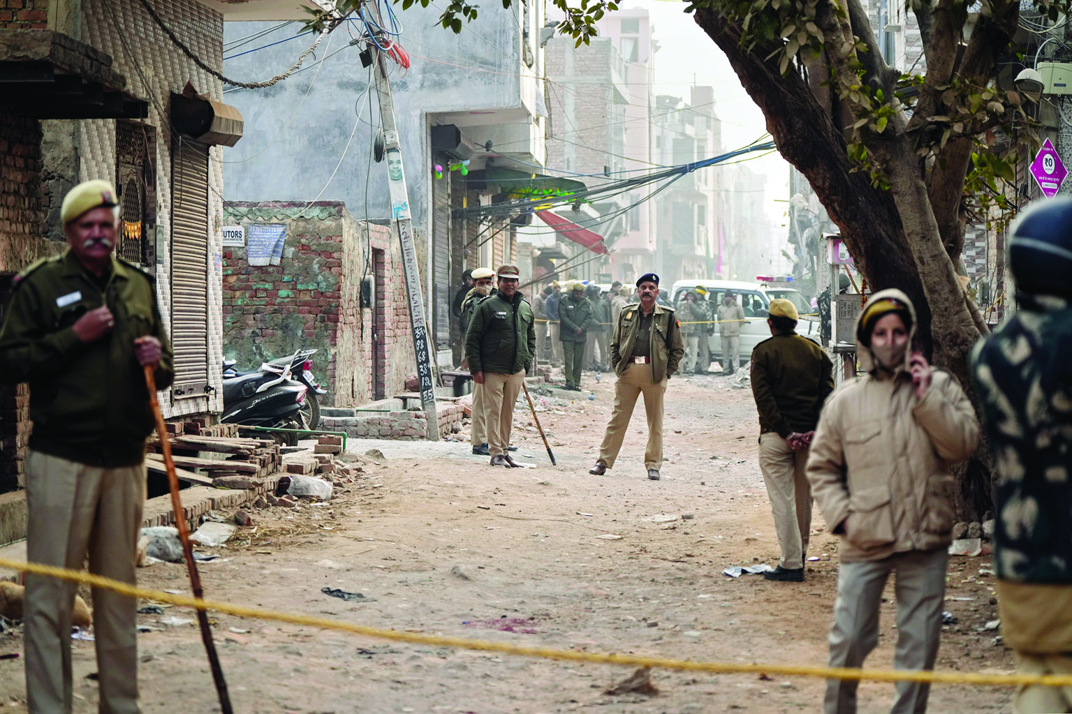 6th person held, 1 surrenders; more CCTV footage emerges