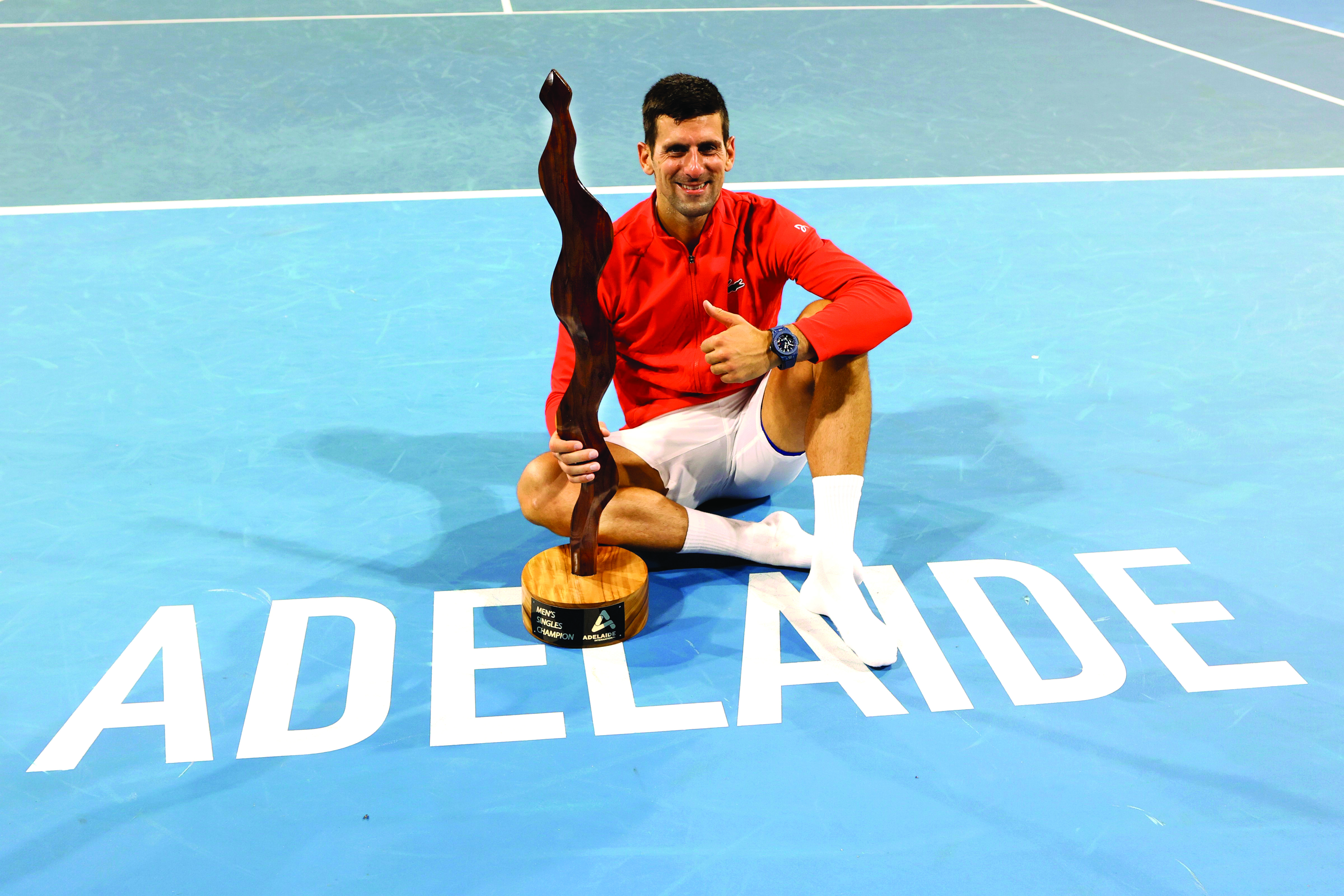 Djokovic shrugs off injury scare, wins Adelaide title Djokovic shrugs off injury scare, wins Adelaide title
