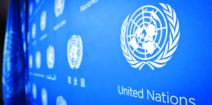 UN apologises after pic shows its personnel in front of Taliban flag