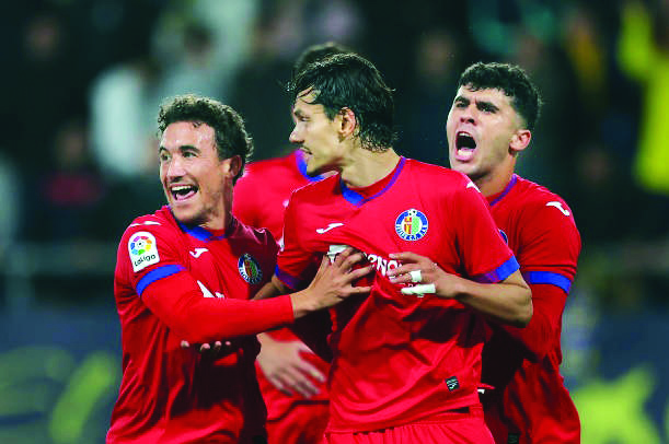 Unal converts 2 penalties, 10-man Getafe draw at Cadiz 2-2 Unal converts 2 penalties, 10-man Getafe draw at Cadiz 2-2