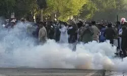Police use water cannon, tear gas on Imran Khans supporters outside his residence in Lahore