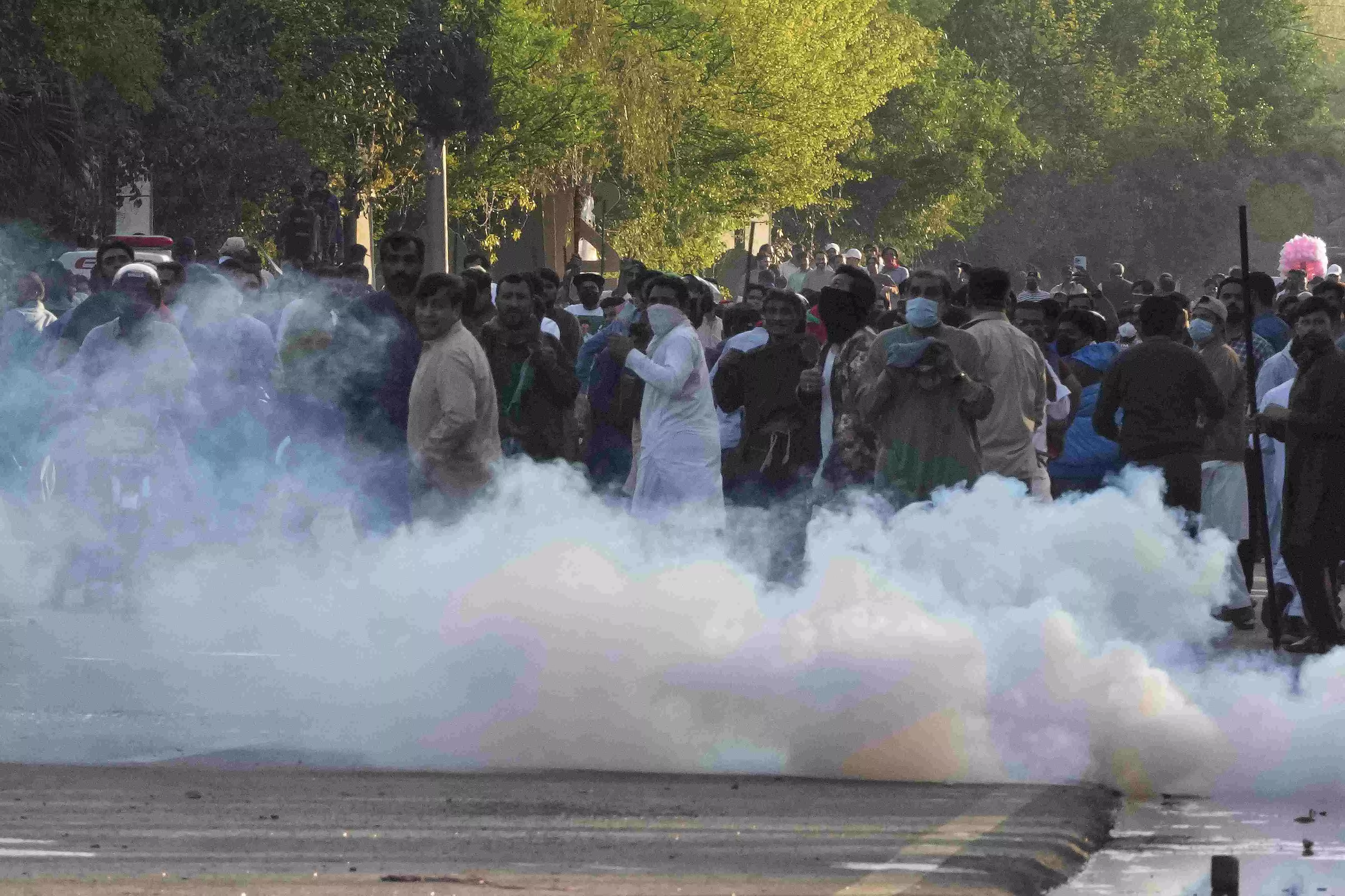 Police use water cannon, tear gas on Imran Khans supporters outside his residence in Lahore