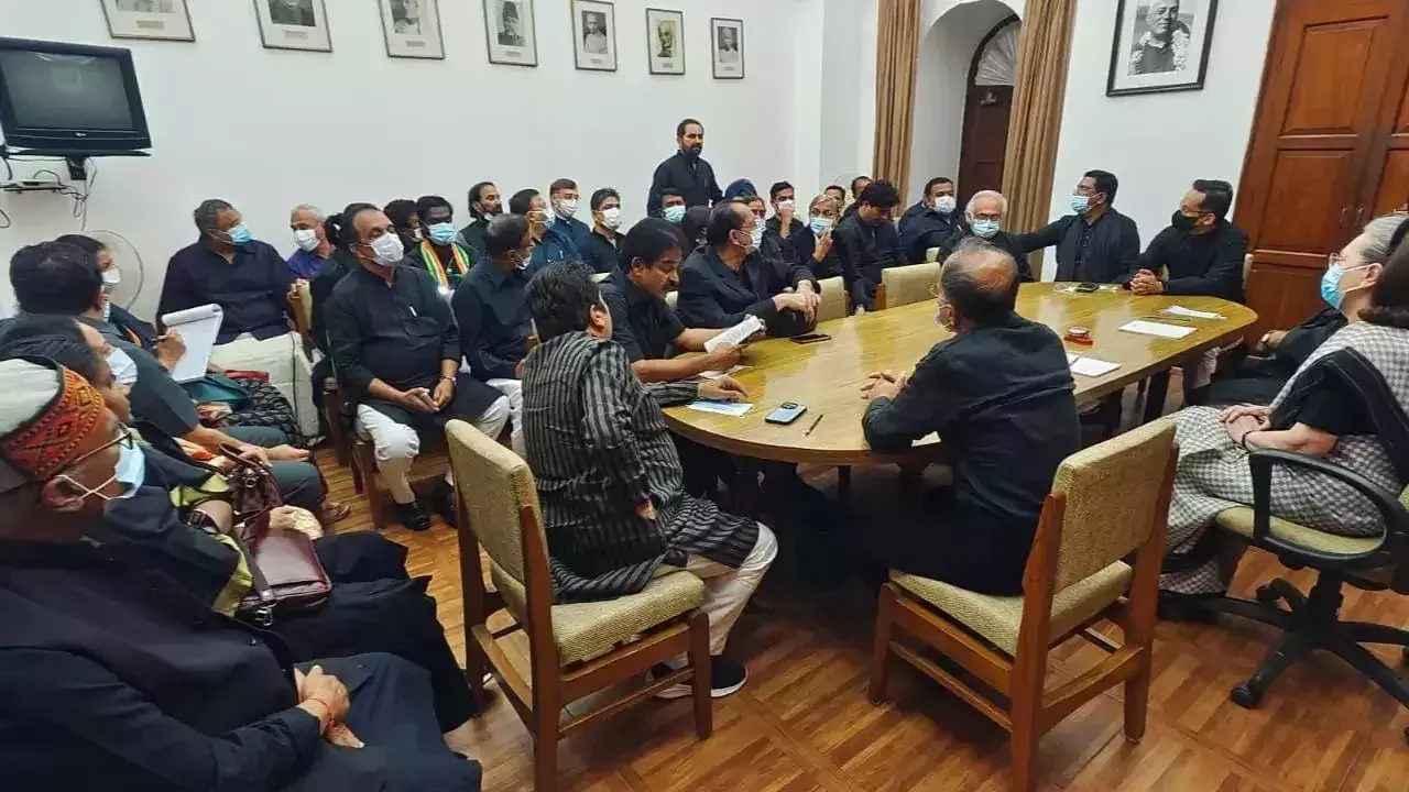 Opposition MPs meet at Parliament complex, some wear black clothes to protest Rahul Gandhis disqualification Opposition MPs meet at Parliament complex, some wear black clothes to protest Rahul Gandhis disqualification