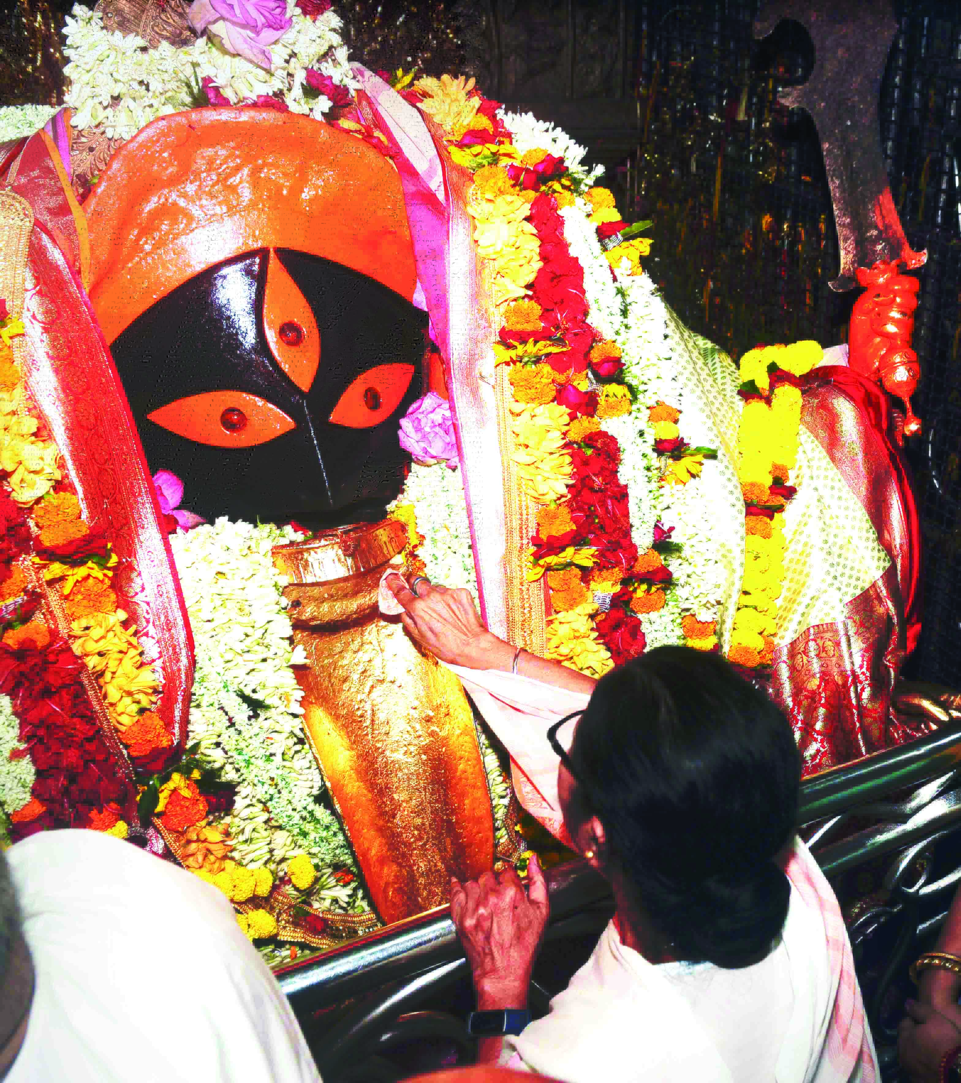 Mamata prays   for all at Kalighat
