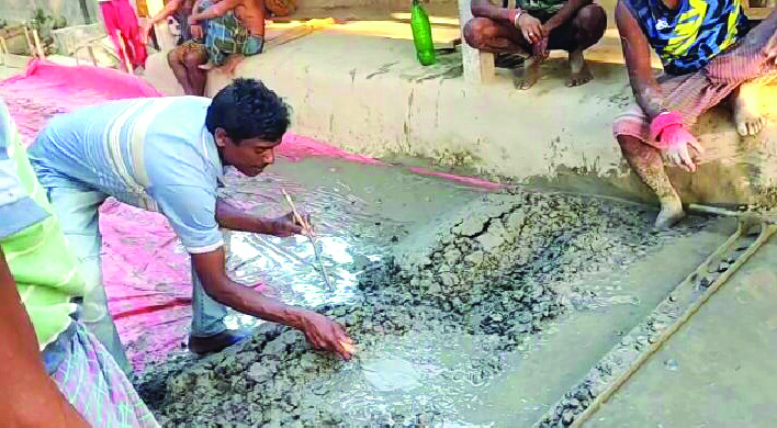 Panchayat Pradhan turns labourer to build road
