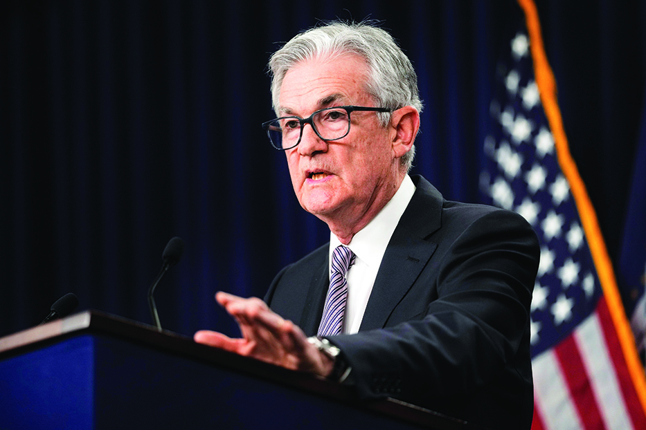 Fed raises key rate but hints it may pause amid bank turmoil