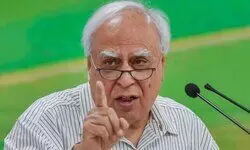 For next 5 years win peoples hearts: Sibal to Cong after Karnataka win