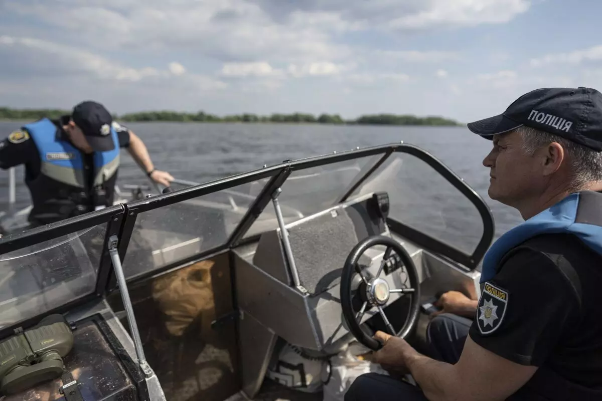 Damage to Russian-occupied dam submerges Ukrainian reservoir island community