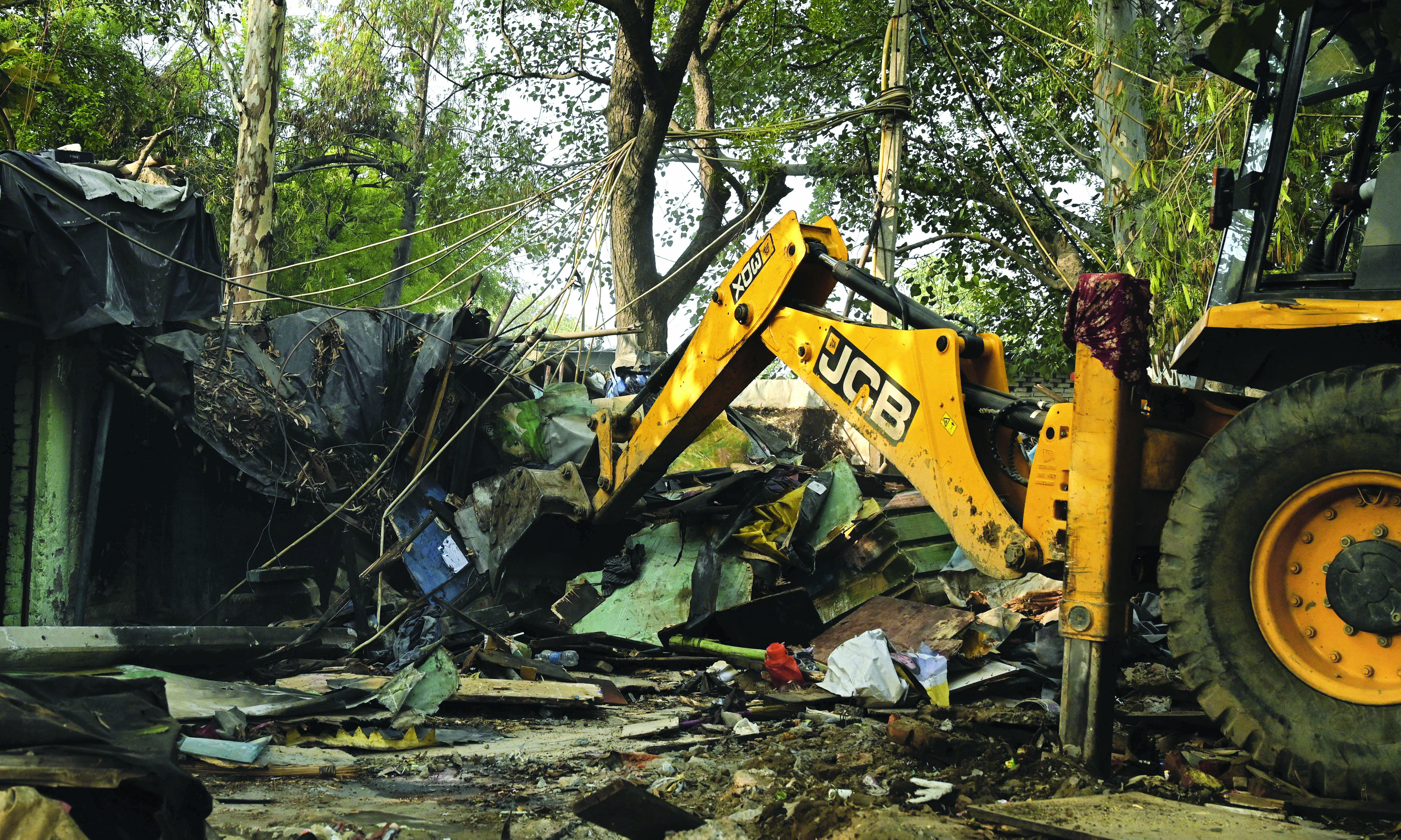 G20 cleanup: Authorities demolish over 55 shanties near Pragati Maidan G20 cleanup: Authorities demolish over 55 shanties near Pragati Maidan