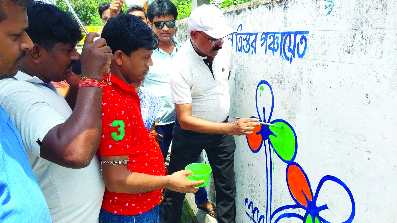 Trinamool starts poll prep with wall writing campaign in Dabgram-Fulbari constituency Trinamool starts poll prep with wall writing campaign in Dabgram-Fulbari constituency