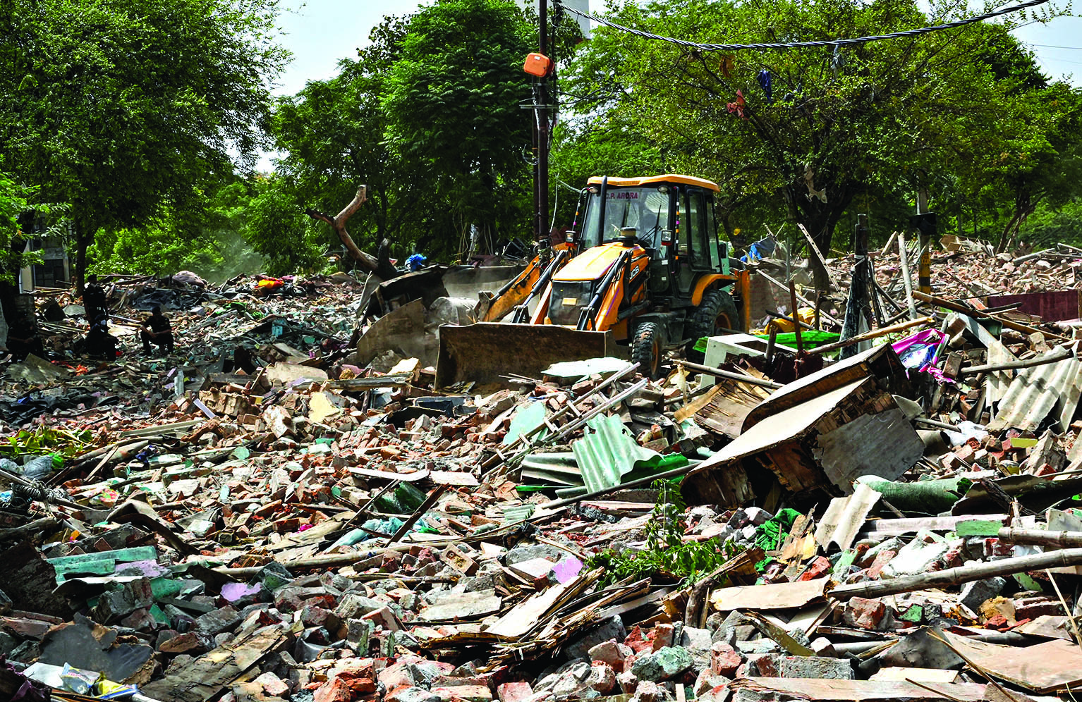 Slum cluster in Vasant Vihar razed