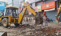 Temple and mazaar removed in Delhis Bhajanpura for flyover