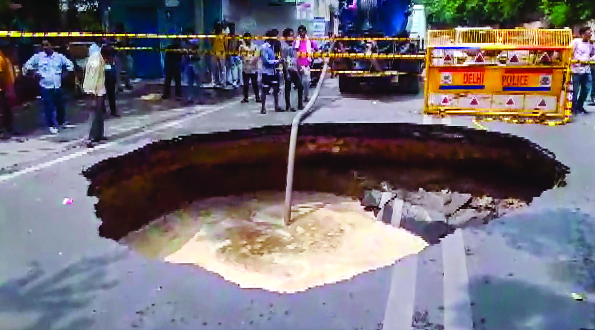 Janakpuri: Road caves in, triggers traffic congestion Janakpuri: Road caves in, triggers traffic congestion