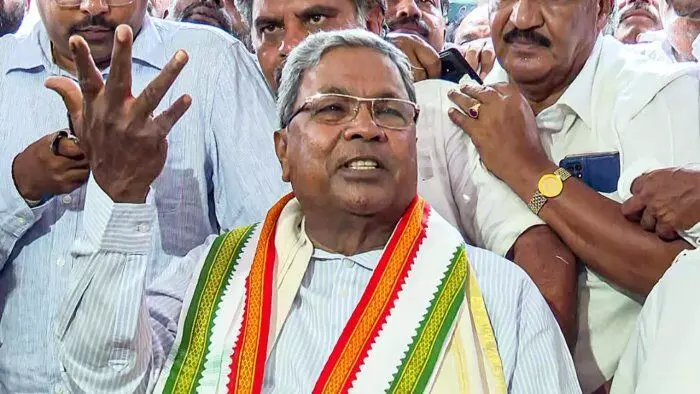 Presenting a record 14th budget, Karnataka CM Siddaramaiah allocates Rs 52,000 for five key poll promises Presenting a record 14th budget, Karnataka CM Siddaramaiah allocates Rs 52,000 for five key poll promises