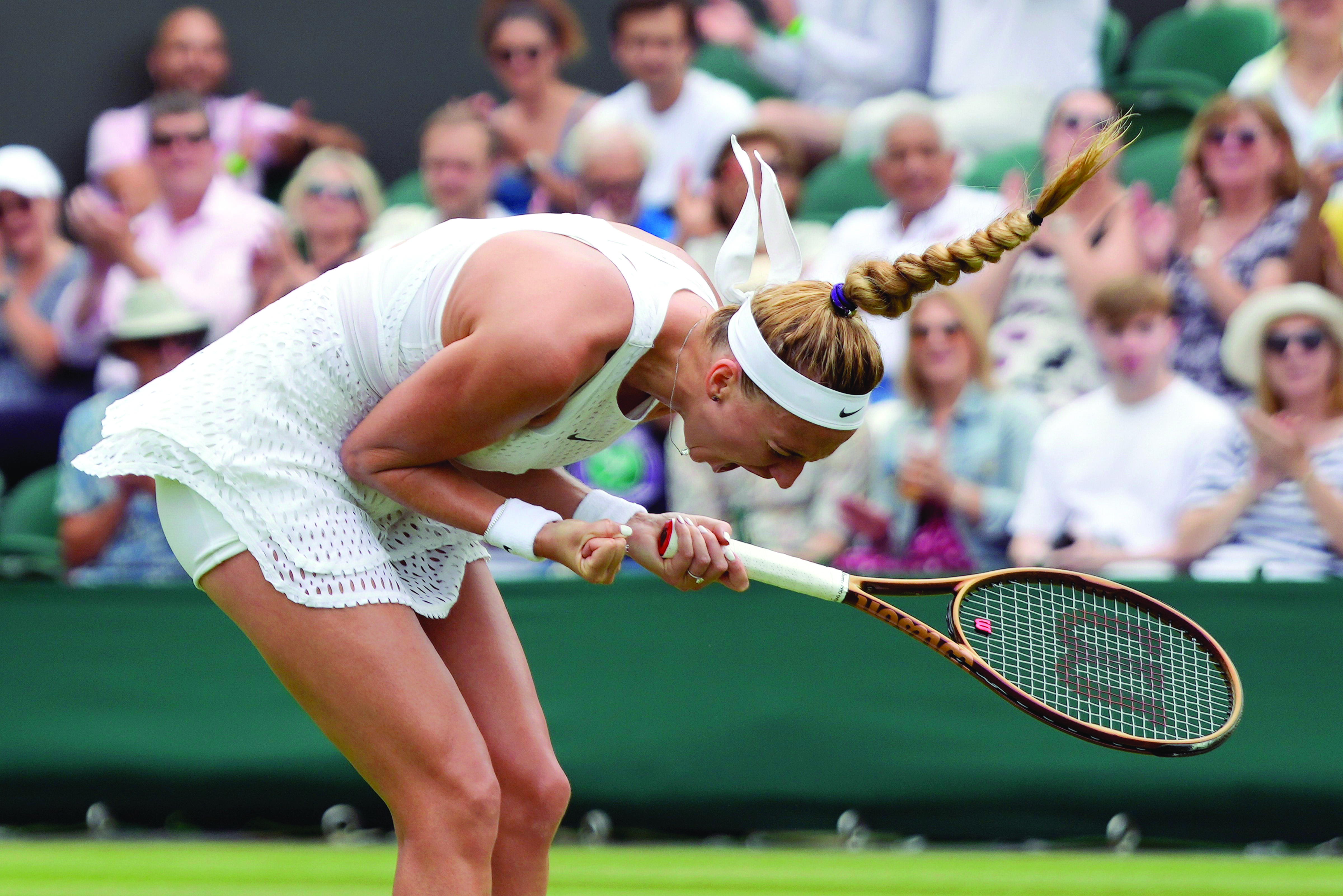 Kvitova stays on track   for 3rd Wimbledon title