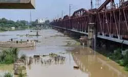 Flood warning in Delhi after Haryana discharges over 1 lakh cusecs of water into Yamuna Flood warning in Delhi after Haryana discharges over 1 lakh cusecs of water into Yamuna