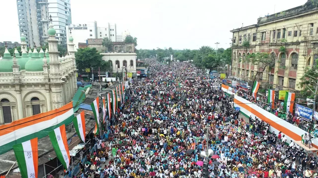 TMC supporters stream into Kolkata for Martyrs Day rally