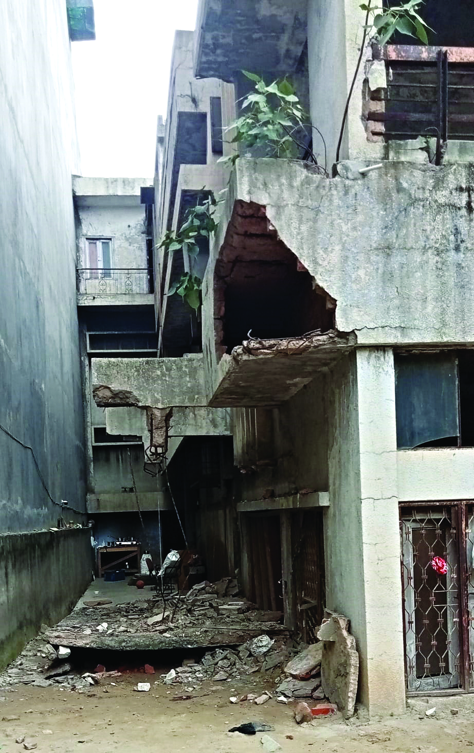Woman, 3-year-old son killed in wall collapse