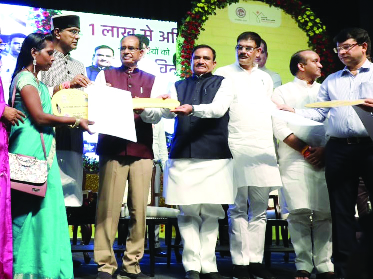MP CM hands over house keys to 70K beneficiaries