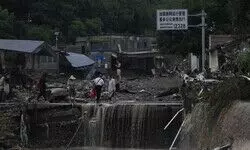 Deadly flooding in China worsens as rescues continue and areas downriver brace for high water
