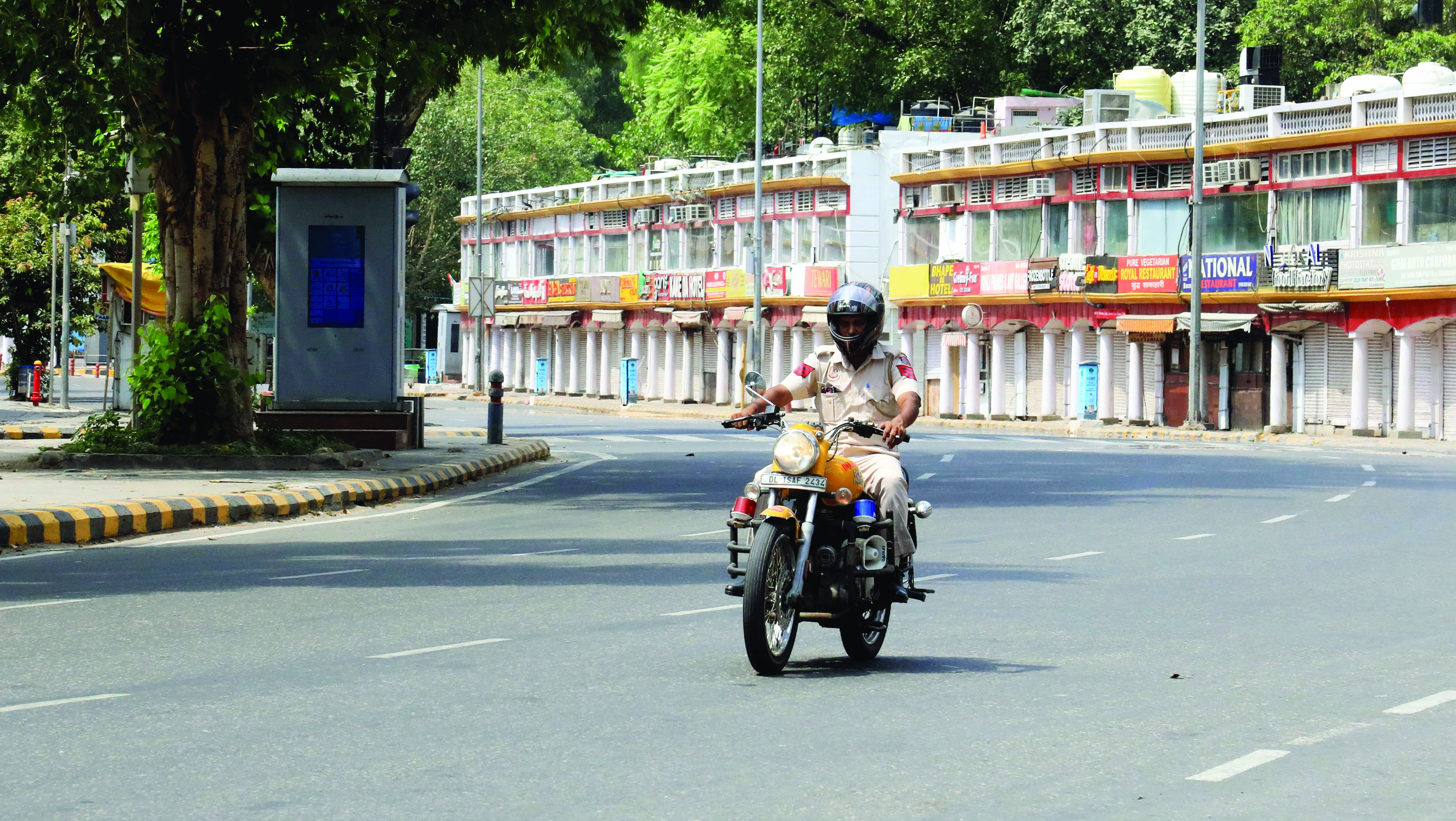 New Delhi roads wear deserted look as curbs kick in New Delhi roads wear deserted look as curbs kick in