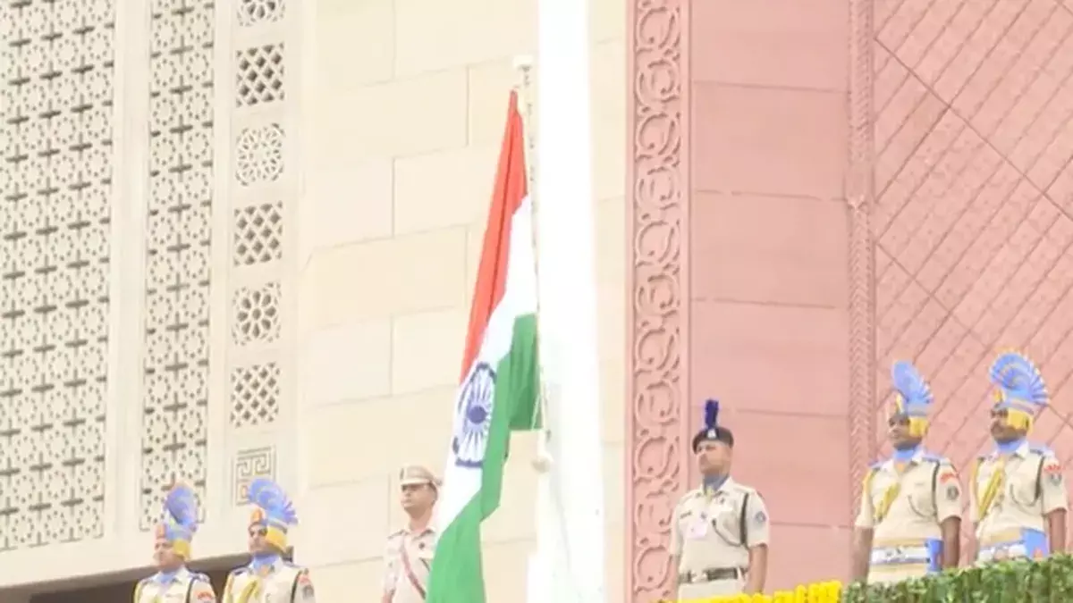 Rajya Sabha chairman hoists national flag at new Parliament building Rajya Sabha chairman hoists national flag at new Parliament building