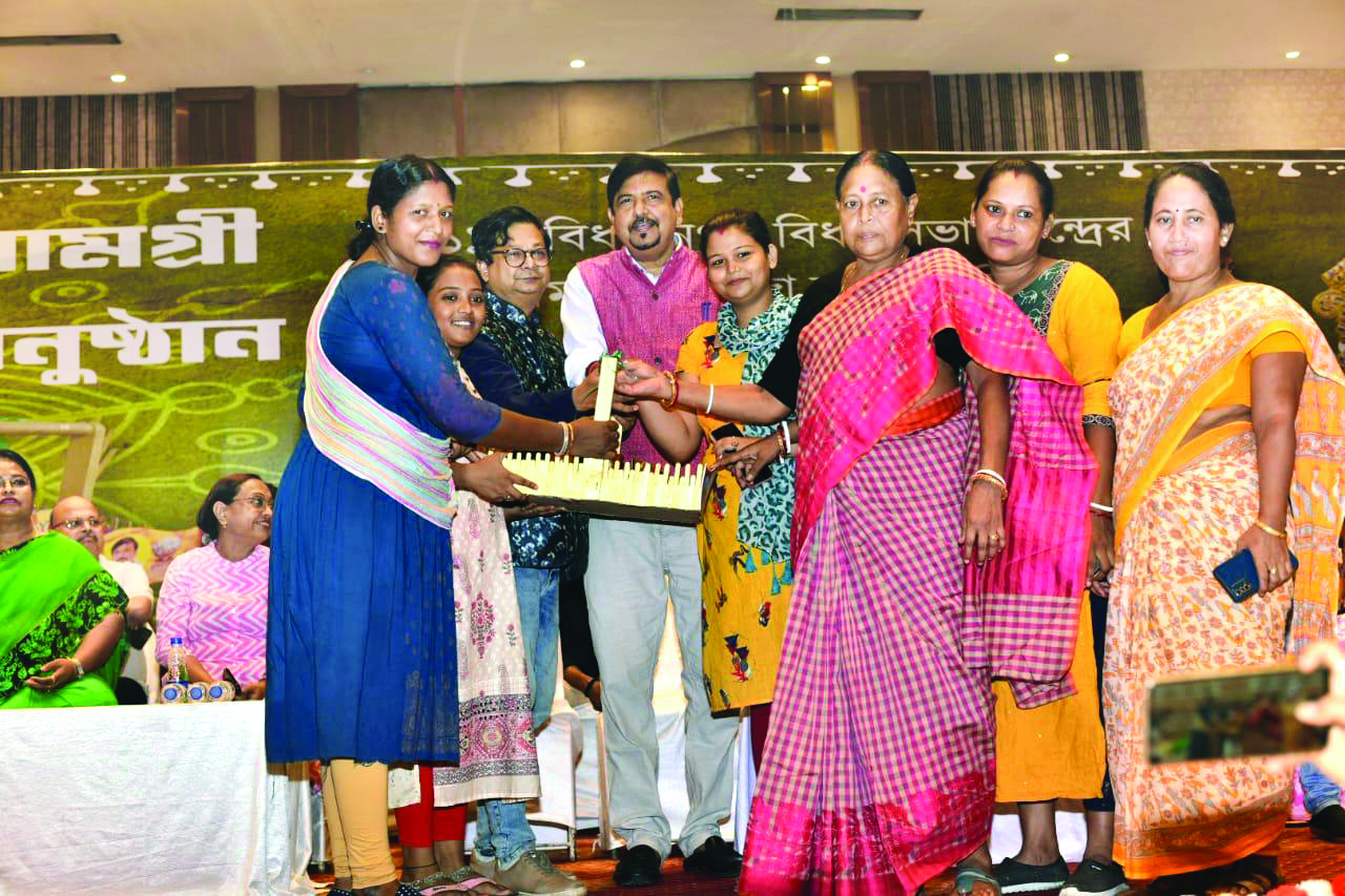 Sujit Bose distributes utensils, sarees ahead of Durga Puja