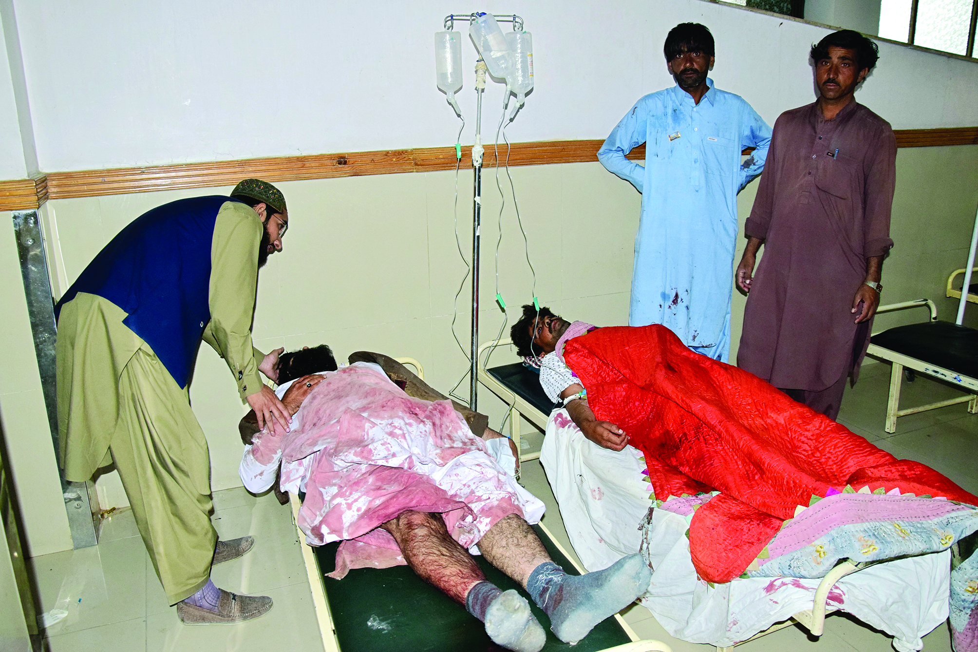 At least 58 people killed in two suicide blasts in Pak