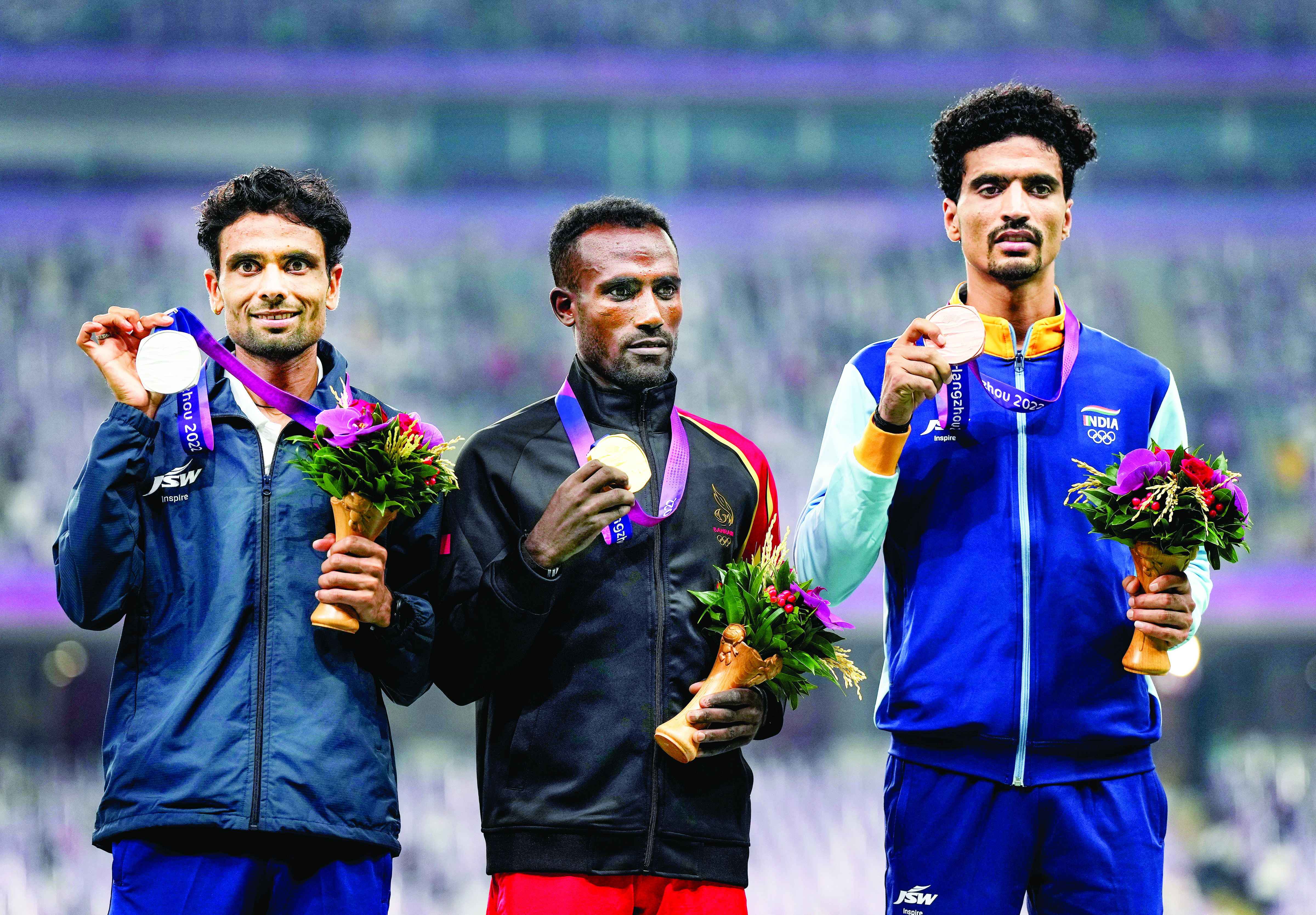Kartik wins silver, Gulveer claims bronze for India in 10000m race Kartik wins silver, Gulveer claims bronze for India in 10000m race