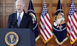 Government shutdown averted with little time to spare as Biden signs funding before midnight