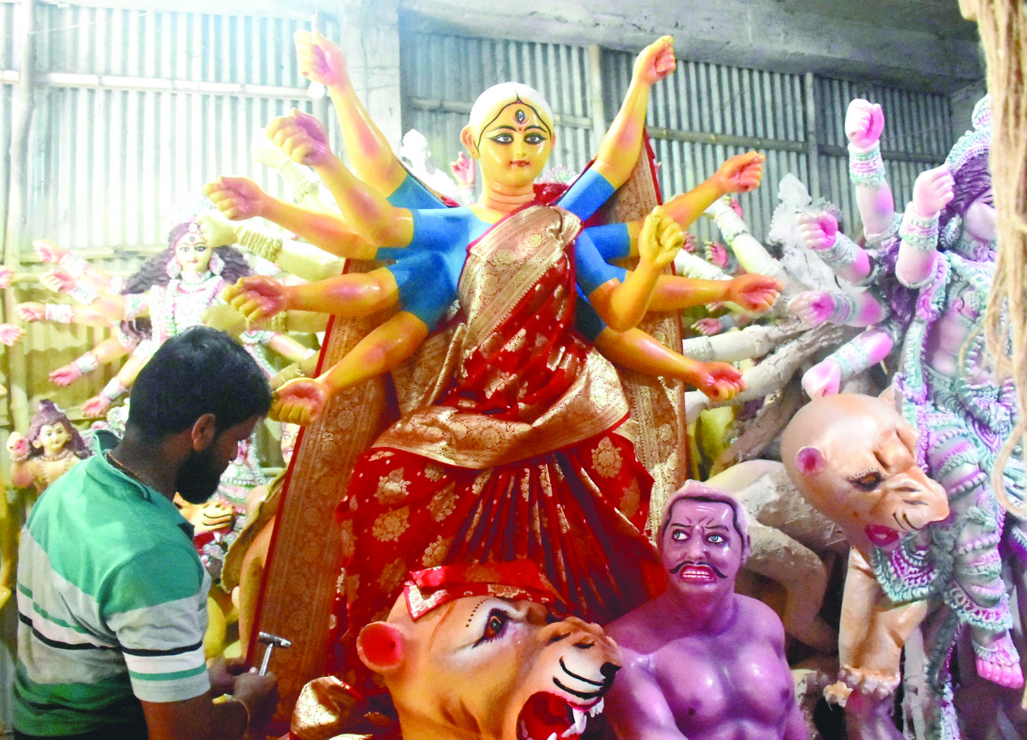 Sikkim disaster casts a shadow on clay idol artisans of Kumartuli, Siliguri Sikkim disaster casts a shadow on clay idol artisans of Kumartuli, Siliguri