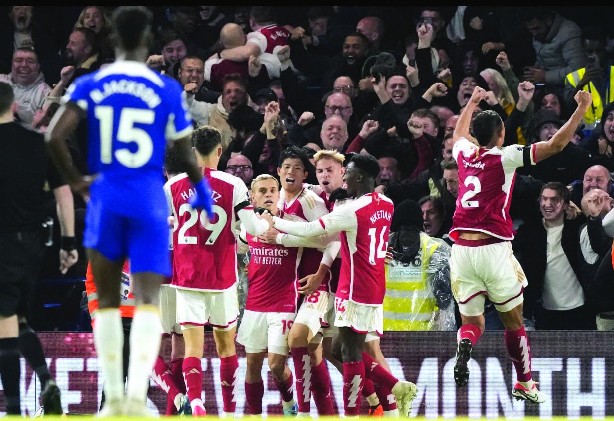 Arsenal rally from 2 goals down to hold Chelsea   for 2-2 draw, stay unbeaten in Premier League